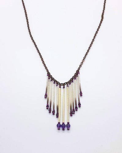 13 strand porcupine quills and 3 amethyst centred stone beads with a 21 inch long copper chain necklace.