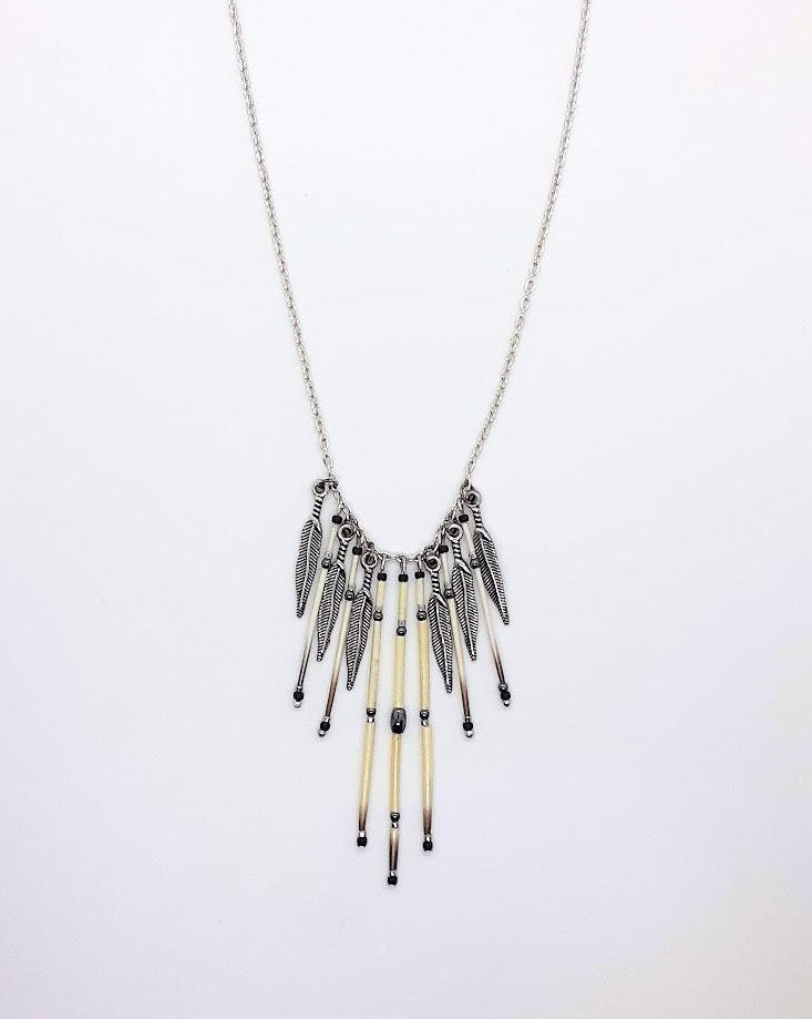 Hematite with 4 short strand quills and 3 large strand centred quills.  With silver eagle feathers