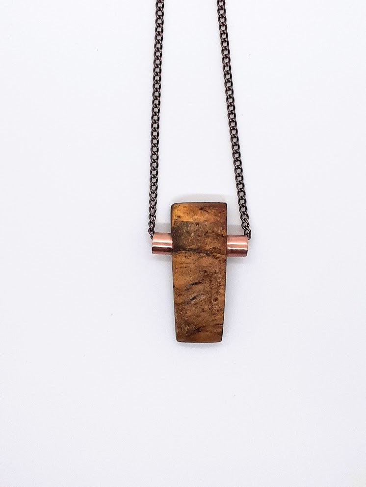 One of a kind. Aromatic Palo Santo wood necklace rectangle carved piece with copper tubing inlay.