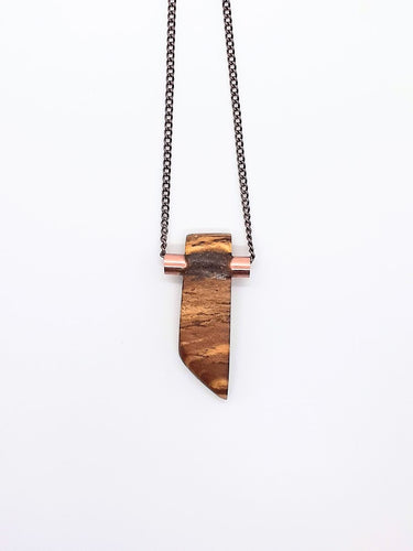 One of a kind. Aromatic Palo Santo wood necklace with copper tubbing inlay.